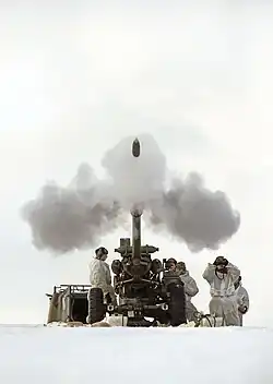 Soldiers of 29 Commando Regiment Firing a 105mm Light Gun on exercise in Norway, February 2014.