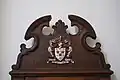 Ceremonial chair with college crest