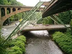 Wuppertal Suspension Railway running beneath Sonnborn Railway Bridge (Sonnborner Eisenbahnbrücke)