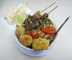 Soto with offals and cockles satays