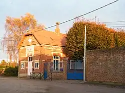 The town hall and school in Sourdon