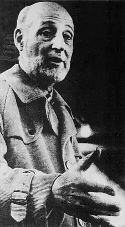 Epton giving a speech, hand out