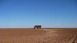 Abandoned farm building on the northeast side of Southland.