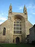 The tall Norman arch of the facade is unique in England