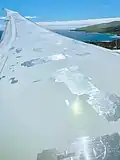 Several patches of speed tape on a Boeing 787 wing