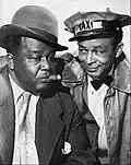 Spencer Williams (1893–1969) was a groundbreaking actor-director-filmmaker. He portrayed Andy on the Amos 'n' Andy TV show (Alvin Childress is pictured with him above in 1952). He also directed the 1941 race film The Blood of Jesus.