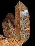 Spessartine on smoky quartz - Wushan Spessartine Mine, Tongbei, Fujian, China