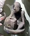 "Figure at mortar" pipe from Spiro, on display at N.M.A.I.