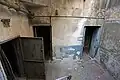 Inside the doors lead off