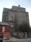 The rear of the church showing the black calp walls