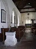 The nave showing the filled-in north arcade.