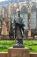A sculpture of St Chad unveiled[28] in 2021 outside Lichfield Cathedral
