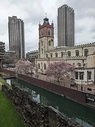 Water park and cafés surround the church and Roman Wall
