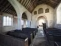 Nave with 15th-century pews, Ten Commandments board, Lord's Prayer & Apostles' Creed