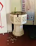 The baptismal font