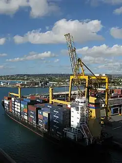 Image 10A container ship docked in the deep water harbour of Bridgetown, Barbados, which opened in 1961. (from History of the Caribbean)