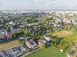 The houses and apartment buildings at the intersection of Puławska and Płaskowickiej Streets.