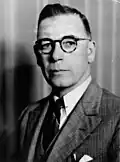 Hanlon as a minister in the William Forgan Smith cabinet, c. 1939.