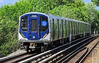 An SIR train of R211Ss arriving at the Jefferson Avenue