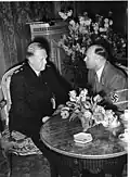 Vidkun Quisling (left) meets with Dr. Hans Draeger, President of the Norwegian Liaison Office in Berlin, at the Adlon, February 14, 1942.