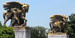 looking northeast at statues of horses