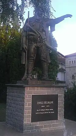 A bronze memorial statue of Zhuj Selmani.