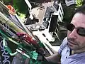 Steeplejack with climbing rope and ascenders replacing a 200 foot steeple in The Rondout section of Kingston, New York