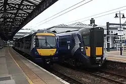 A Class 170 on the left and a Class 385 on the right