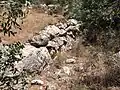 Reused stones that form a wall at Chezib (Achzib) of Judah