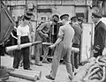 Crew storing fixed rounds on the Kingfisher-class sloop Widgeon, August 1943