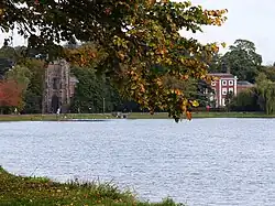 Photograph of Stowe Pool, with Stowe House in the background