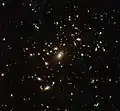 Abell 2537 is useful in probing cosmic phenomena like dark matter and dark energy.[28]