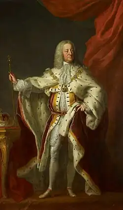 An oil portrait of George II in his coronation robes, holding the sceptre in his right hand. On the table to his right is the Imperial State Crown of George I.