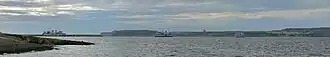 The whole path of the Gozo ferry, seen from Ramla Bay, Marfa. To the left Ċirkewwa terminal, to the right Mġarr harbour on Gozo