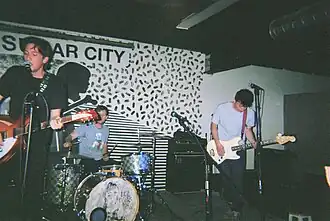Feeley (left), McClure (center), Cox (right) performing at Sugar City in Buffalo, NY in June 2017.