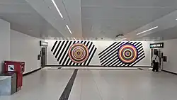 Closer view of Super Signals by Douglas Coupland in the Line 5 portion of the station