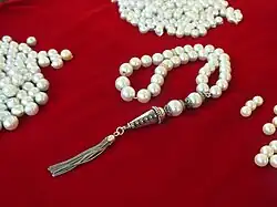 Pearls on a red cloth