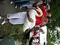A Queen's swan upper with a mute swan during 2010 swan upping at Henley-on-Thames