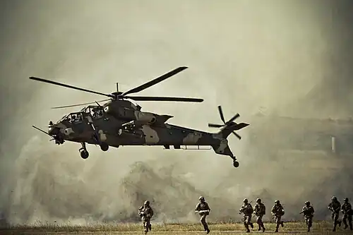 Rooivalk attack helicopter during an air show.