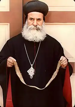 Late His Eminence Meletios Barnabas, former Arch Bishop of Homs, with the Holy Girdle of the Virgin Mary