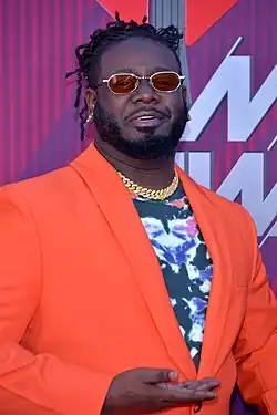 Image 37T-Pain was initially criticized for popularizing autotune, which is now considered an iconic trend of the decade. (from 2000s in music)