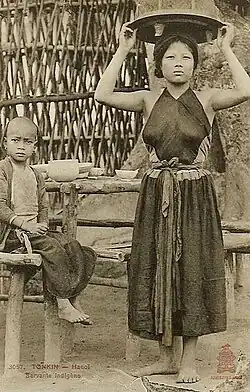 A woman in Hanoi wearing yếm and váy đụp
