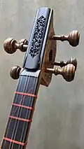 A Persian tar head with ebony