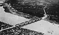 The 1925 iron truss bridge The area that is now Sanchong is in the background
