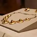Tairona necklace and earrings. Shaped like cymbals. 1000 CE. San Antonio Museum of Art