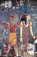 Horemheb behind Isis