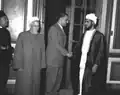 Talib Alhinai (right) and Egypt's President Gamal Abdel Nasser (left) shaking hands in Cairo
