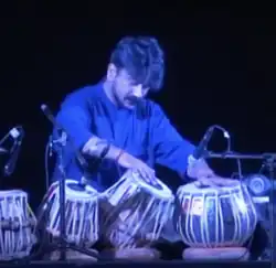 Singh performing in 2012