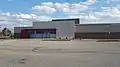 The abandoned Target store at Cloverdale Mall in Etobicoke, Ontario (store #3715) in 2017. This location was replaced with a COVID-19 Vaccine Clinic in 2021. However, it closed down in 2023 due to most people being vaccinated from COVID-19 and most pharmacies offering COVID-19 vaccinations. As of 2025, Fairgrounds Public Racket Club took over the space.