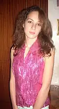 Girl wearing a 1973-vintage lamé top with the Granny Takes a Trip label.